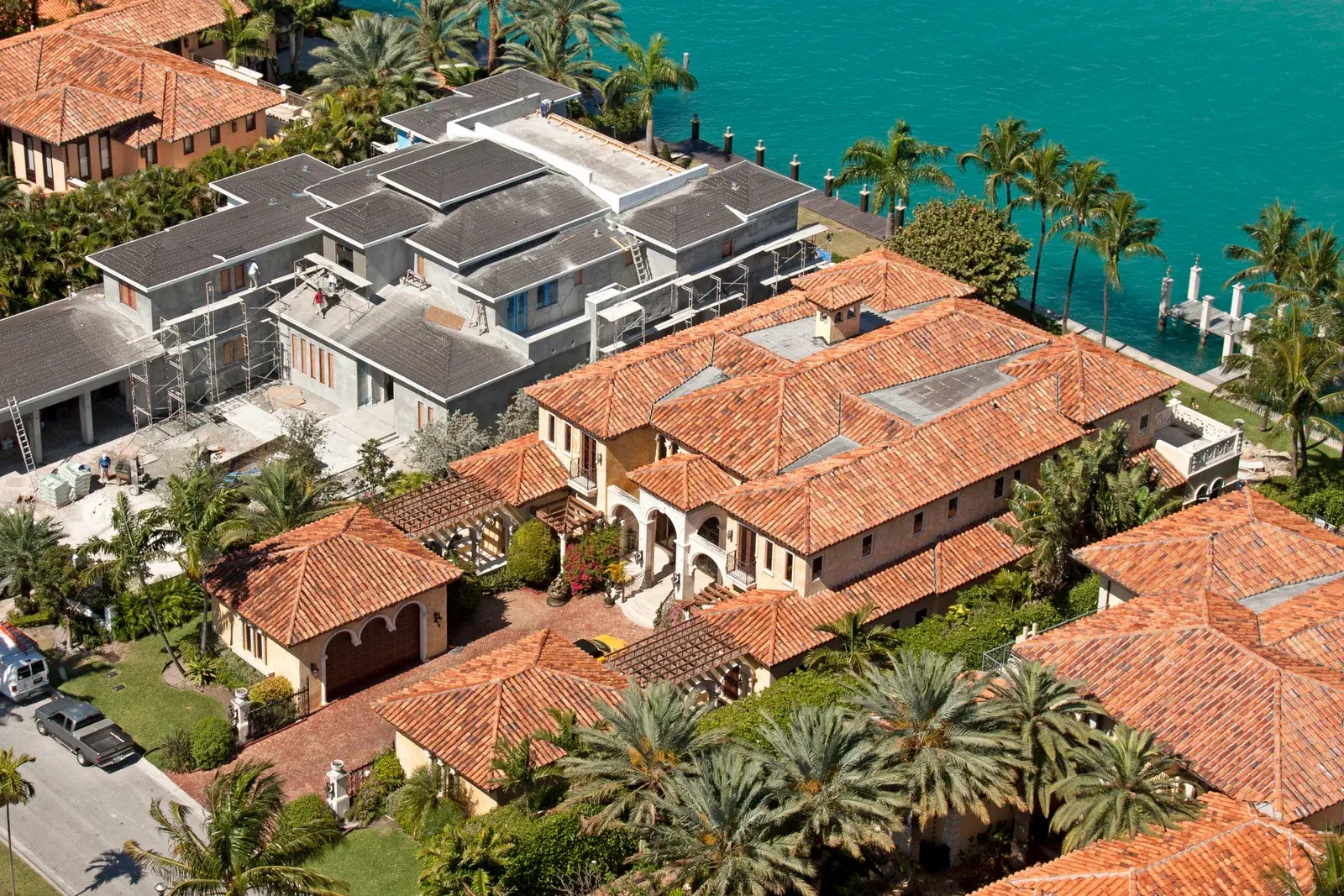 Star Island Miami Beach-area waterfront estates with terracotta barrel tile roofs, aerial view.