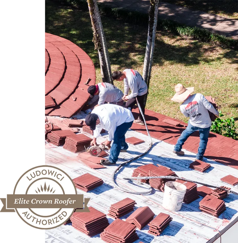Istueta roofers installing red Ludowici clay tile as an authorized Elite Crown Roofer