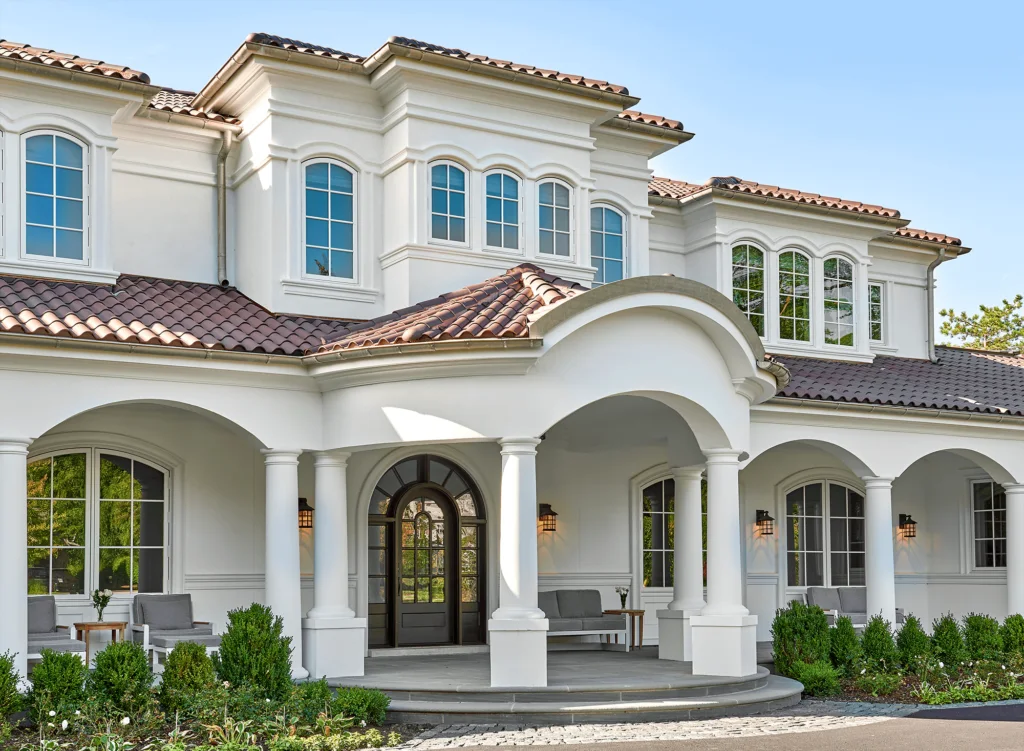 White estate with a variegated Ludowici barrel tile roof