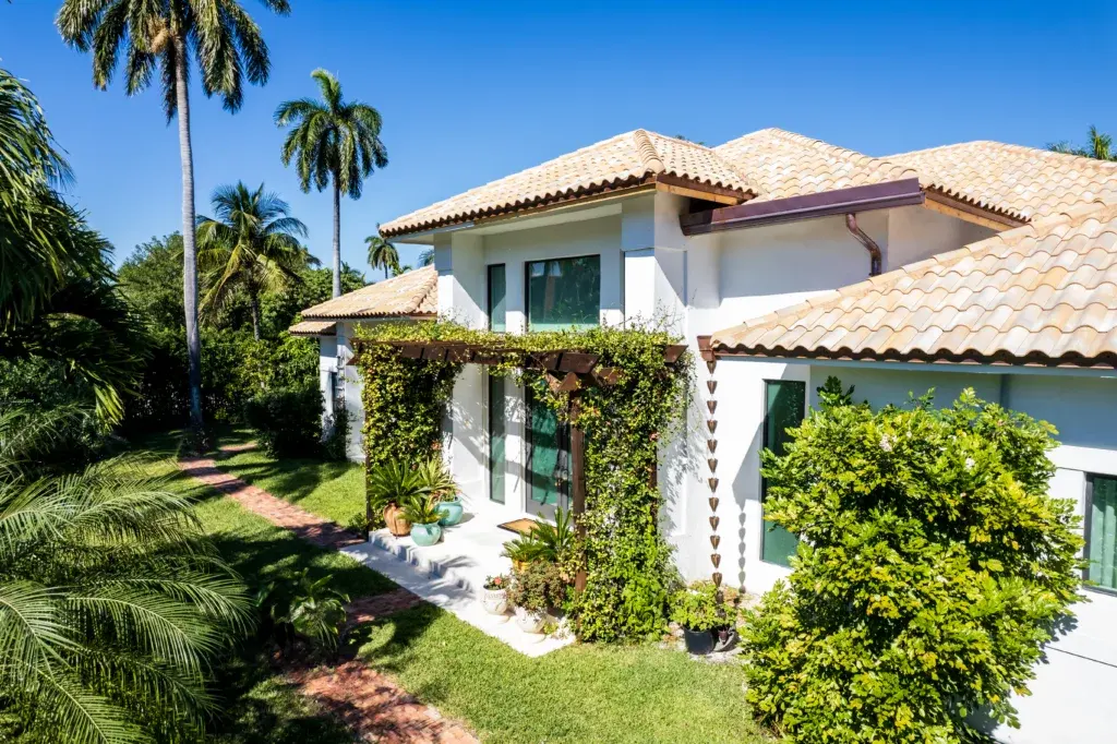 Tropical residence with a light Ludowici barrel tile roof