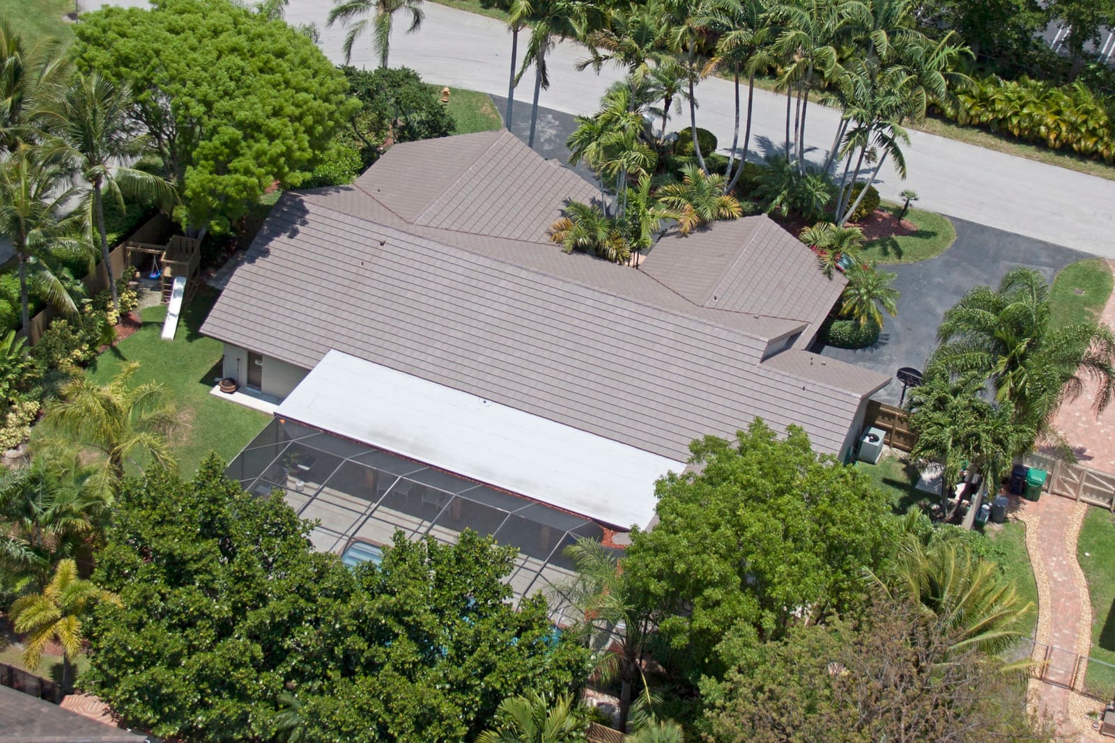 Crown concrete tile roof on a Kendall home, aerial view of the completed installation.
