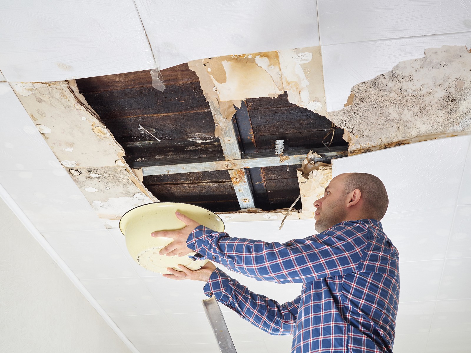 Man with leaking roof
